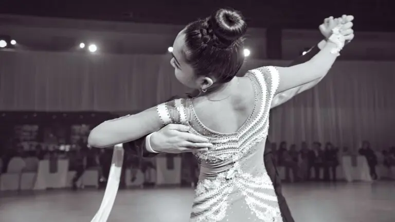Graceful ballroom dance performance capturing elegance and skill, indoors in Vancouver.