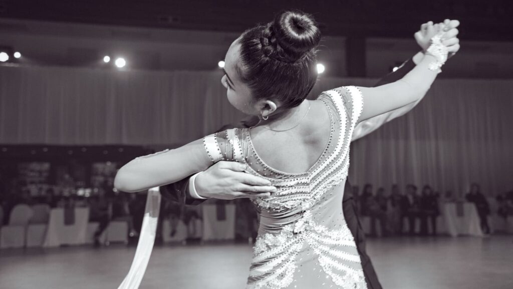 Graceful ballroom dance performance capturing elegance and skill, indoors in Vancouver.
