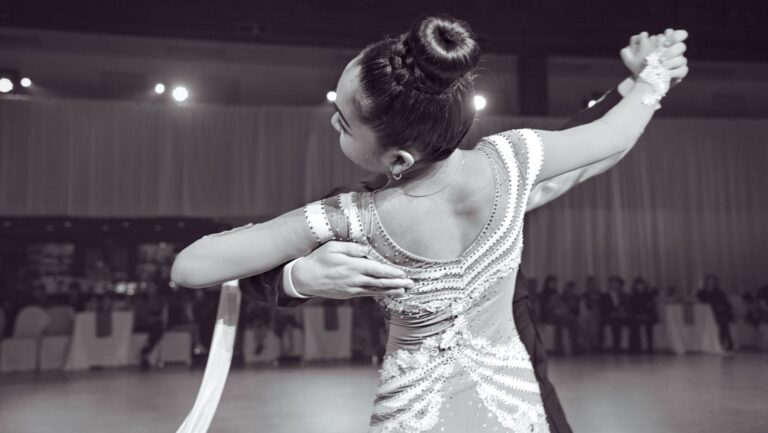 Graceful ballroom dance performance capturing elegance and skill, indoors in Vancouver.